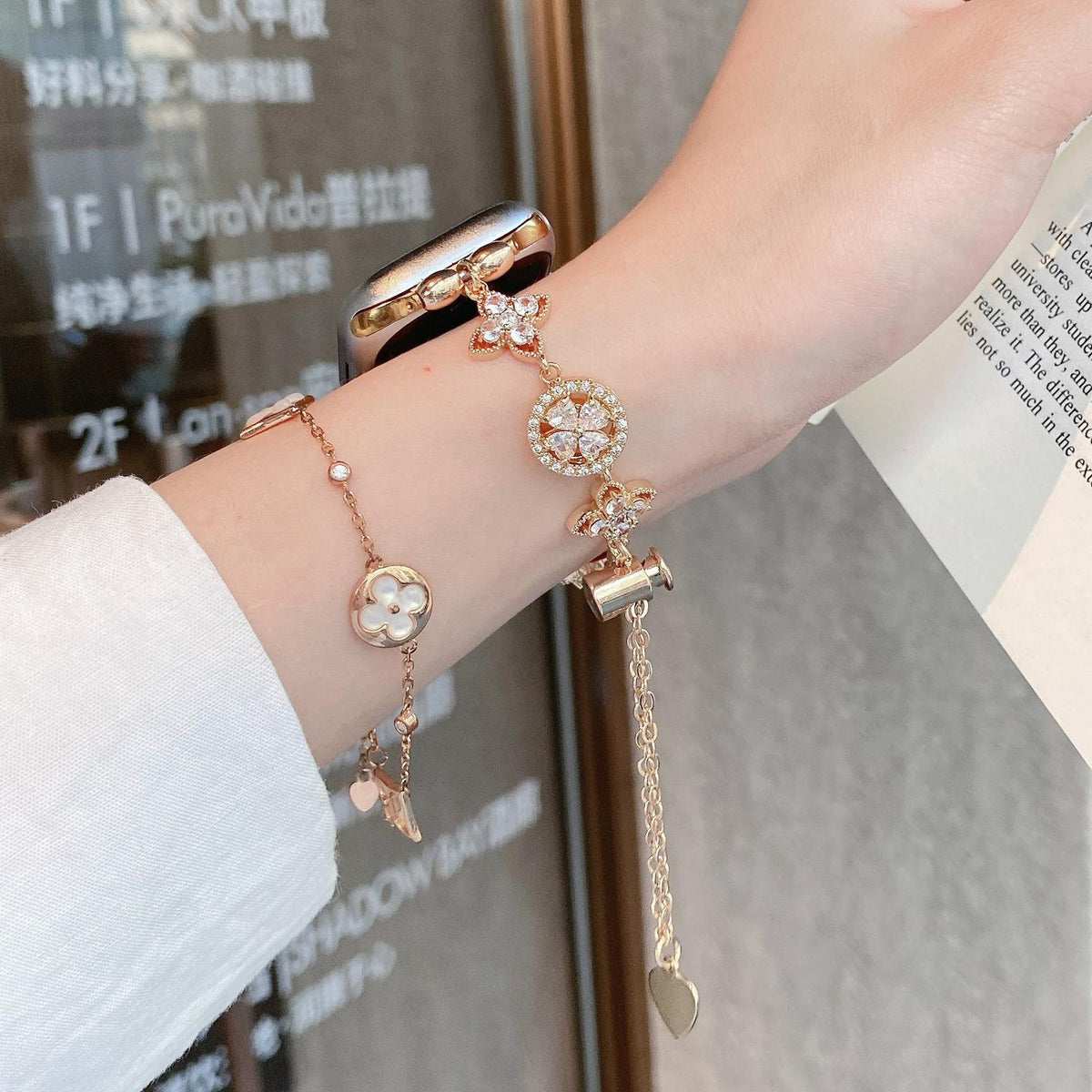 iBandGear Crystal Flower Charm Gold band on wrist; separate bracelet not included