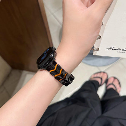 iBandGear FluidLink Black - Orange band worn on the wrist