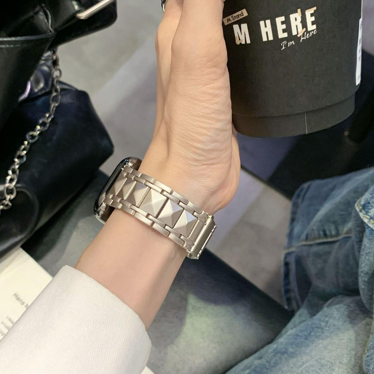 iBandGear Sculpted Pyramid metal band worn on the wrist, showing raised center links and smooth side links