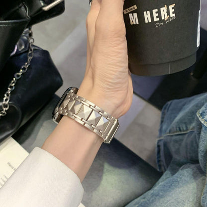 iBandGear Sculpted Pyramid metal band worn on the wrist, showing raised center links and smooth side links